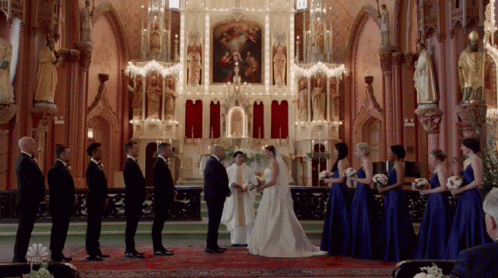 the bride and groom are getting married at a church alter