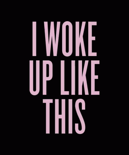 the words i woke up like this in pink on a black background