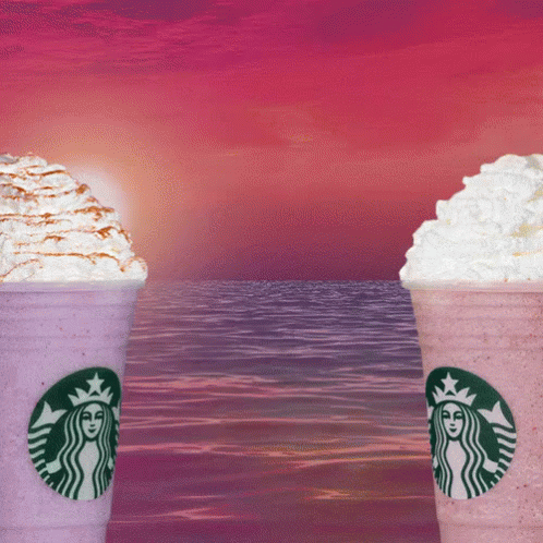 a couple of cups filled with whipped cream and starbucks