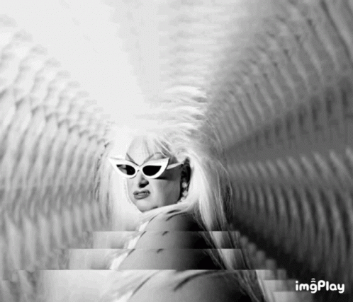 black and white po of a blonde woman in shades