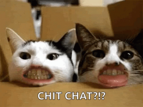 two cats with teeth that have fake mouths