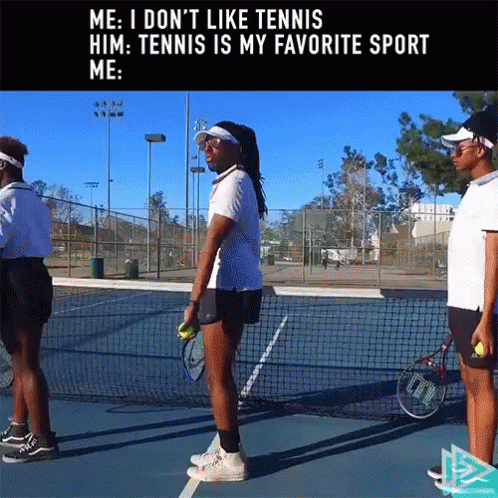the tennis players stand near their net in their stance