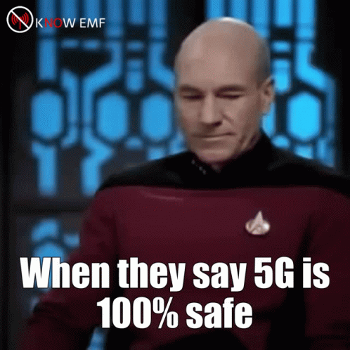 a man in purple has his hands up and says, when they say 6 6 is 100 % safe