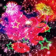 a computer screen showing some fireworks and stars