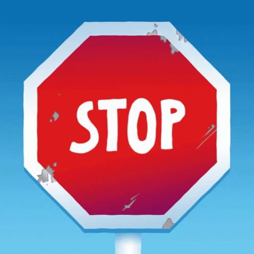 a large blue stop sign with graffiti on the side