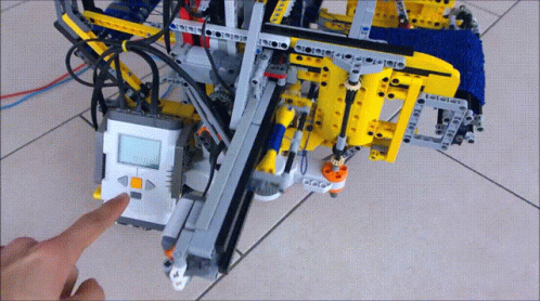 a person working on an assembled robot
