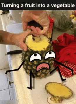 an upside down pineapple has a cartoon face