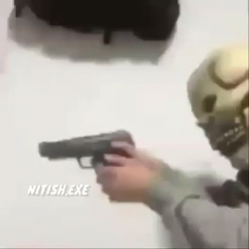 a blurry s of someone shooting a gun
