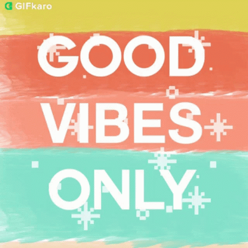 the words good vibes are painted with colored paint