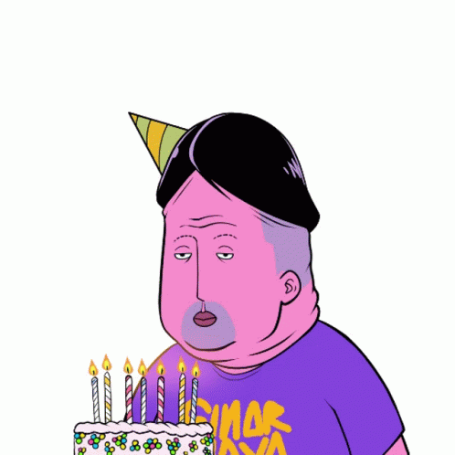 the birthday cake has candles on it in a male face