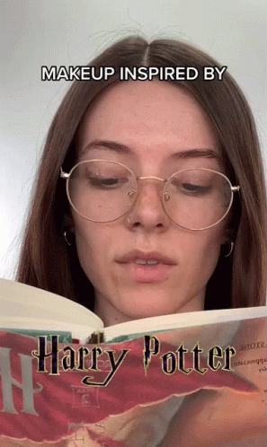 a woman reading harry potter from the book make up inspired by