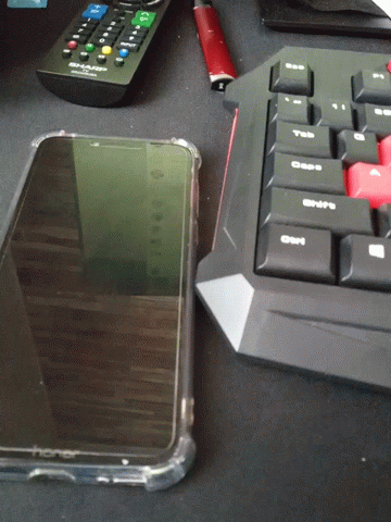 a close up of a keyboard and cell phone
