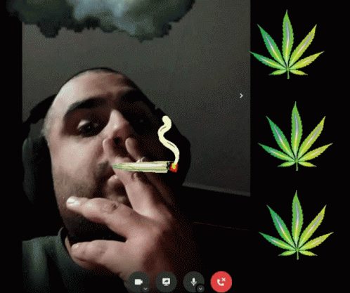 a man is shown smoking a cigarette and smoking marijuana