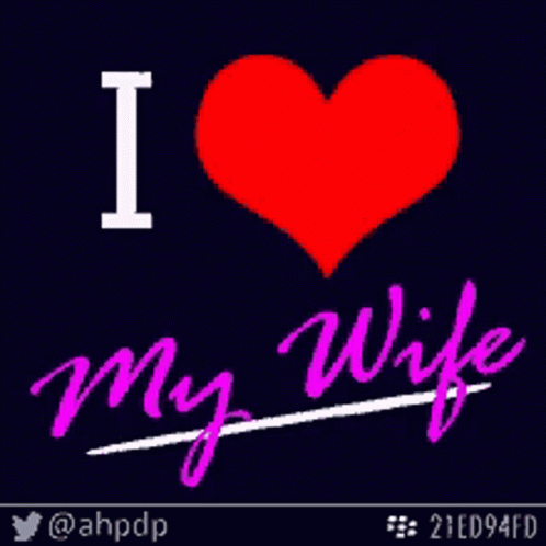 the word i love my wife in a white and pink heart