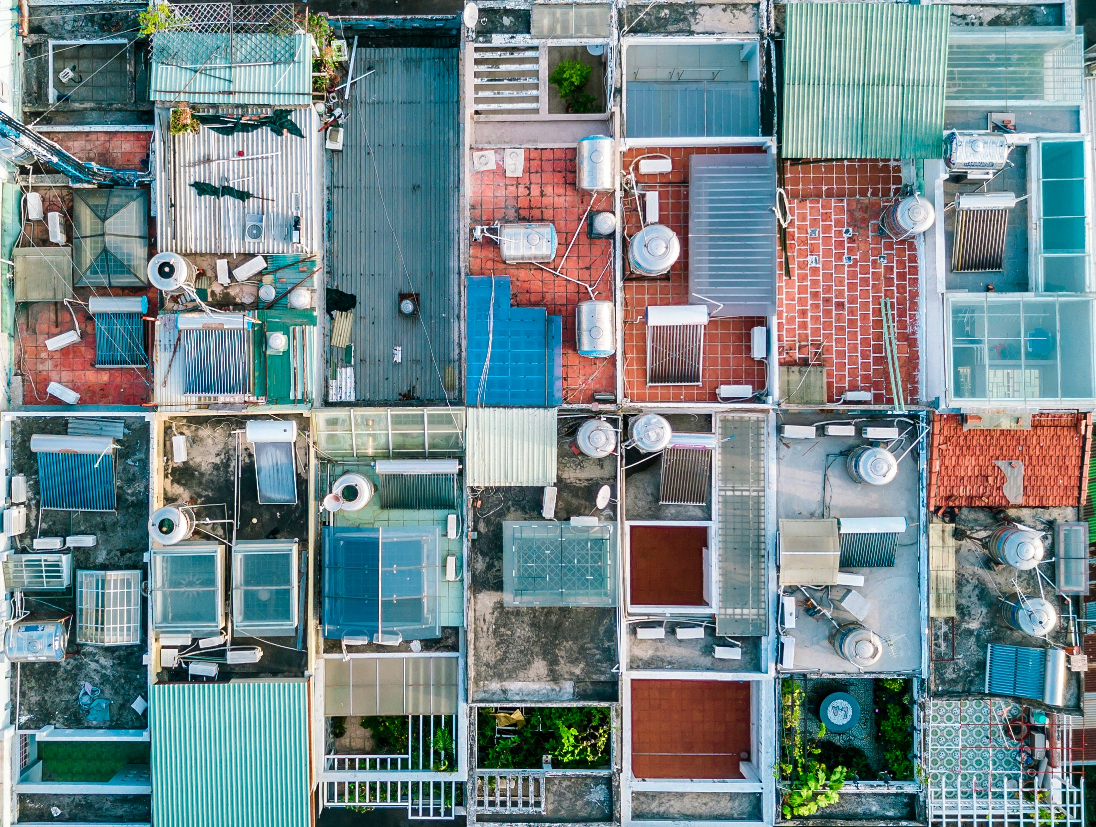 an aerial view of many windows and doors in different colors