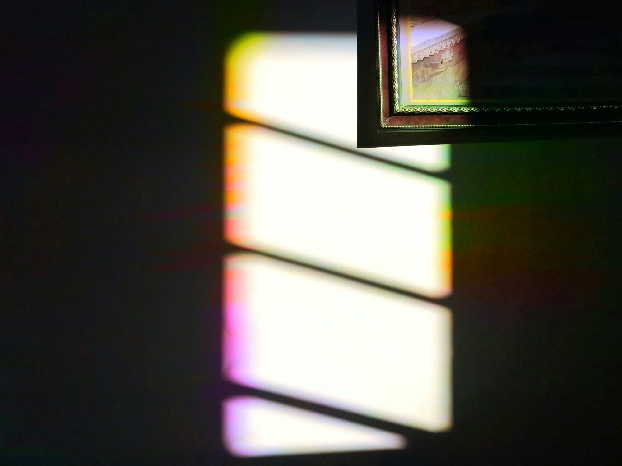 an image of sunlight shining through the window onto the wall