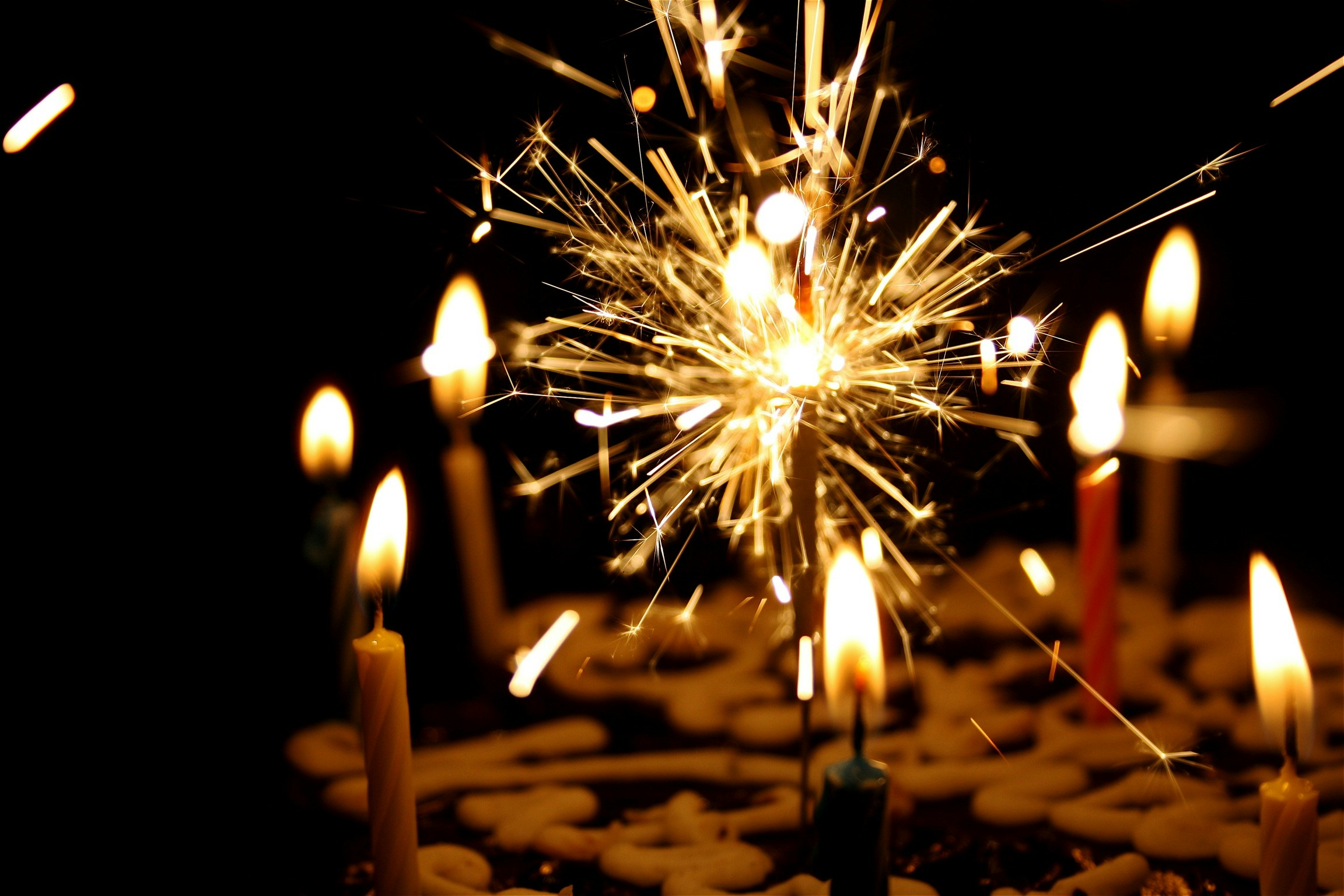 this is an image of birthday cake with candles in the middle