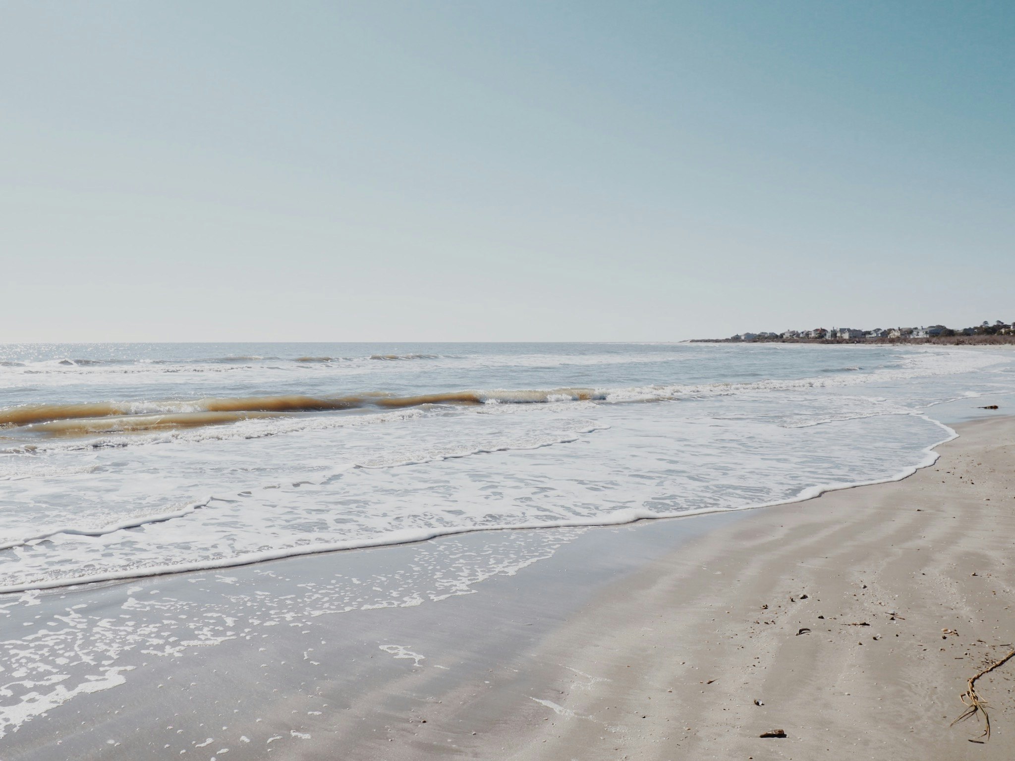 some very pretty beach by the water